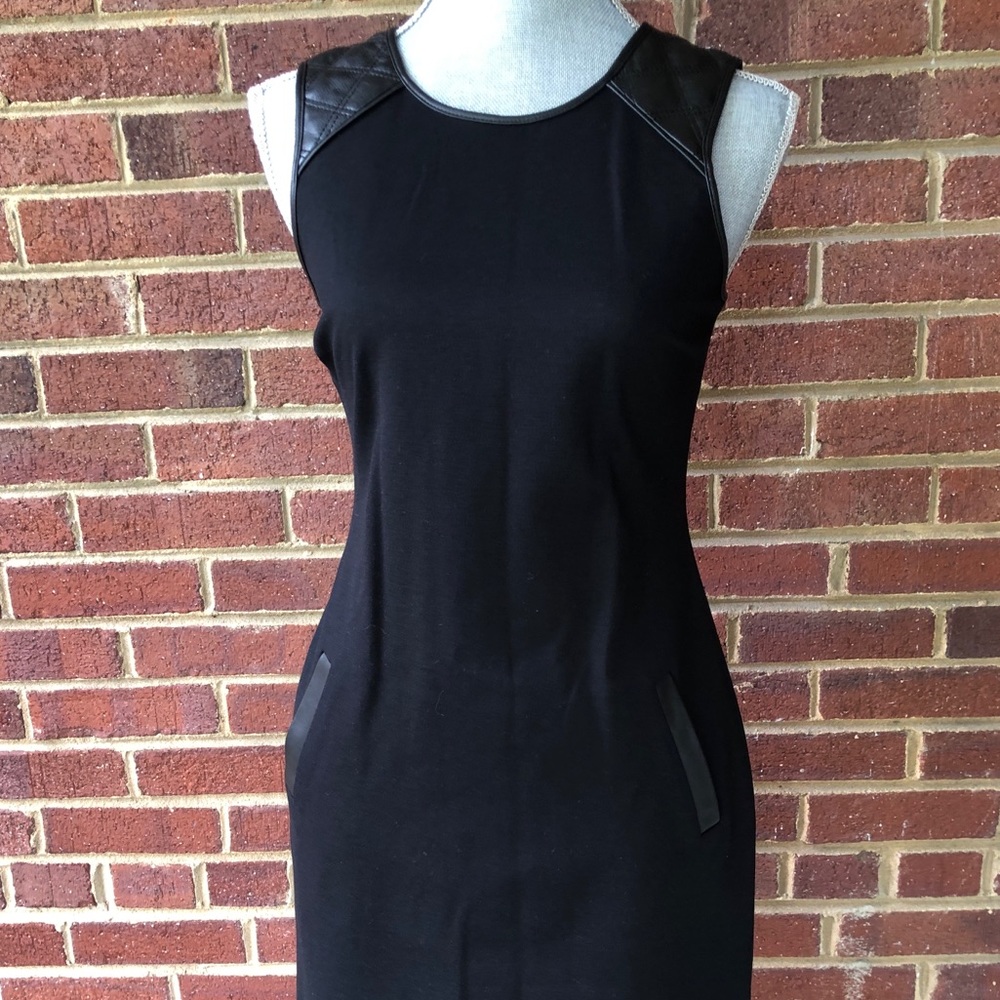 Black sheath dress with leather and pockets